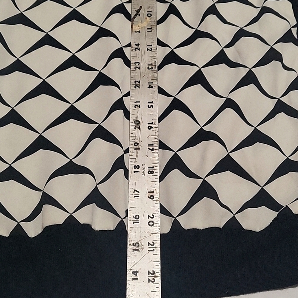 Lightweight sweater with sheer front black pattern on white